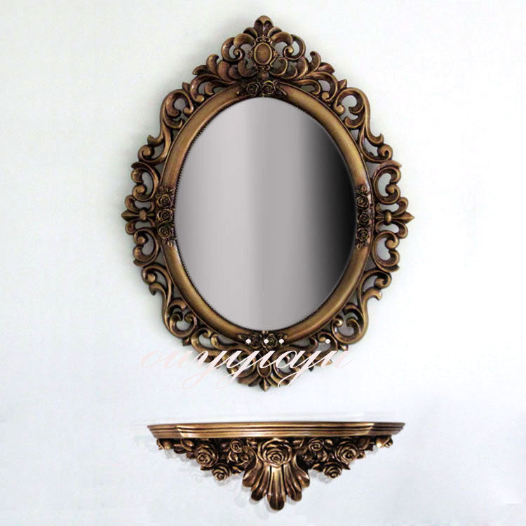 large decorative oval wall mirror
